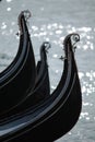 Three Bows of Gondolas in Venice in Italy Royalty Free Stock Photo